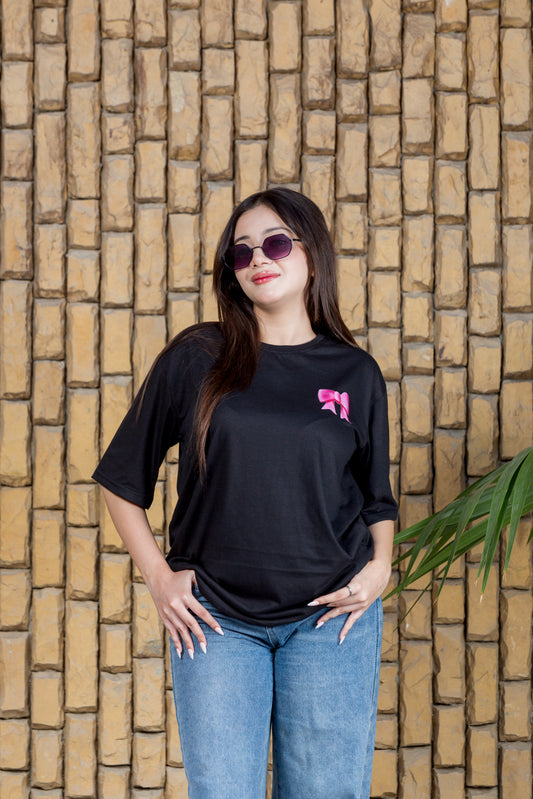 Black oversized t-shirt with front icon and back “I'm Just A Vibe” print

