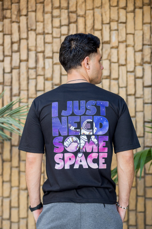 Oversized black t-shirt with front astronaut and “I Just Need Some Space” back design